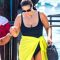 Model Ashley Graham Dolls Up on Vacay with Sensi Studio Hat + Handbag!